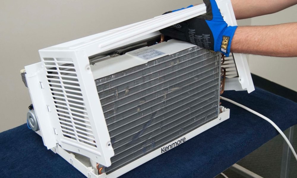RG-WAC-Pull-outward-on-the-bottom-of-the-outer-case-and-remove-the-outer-case-from-the-air-conditioner